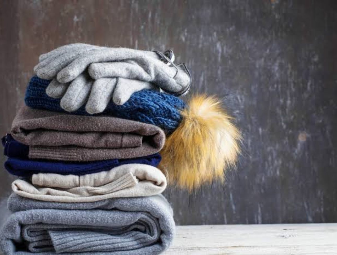Essential clothing and gear packed for the Annapurna Base Camp trek in Nepal